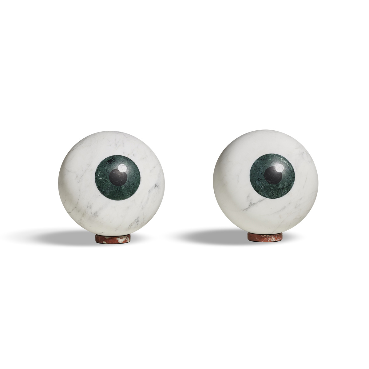 a pair of marble eye balls by Philippe Cramer