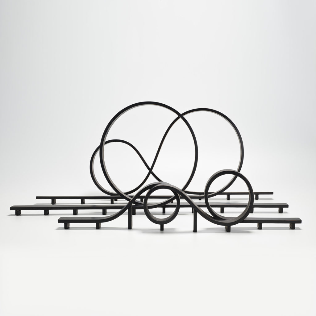 patinated dark bronze ribon like sculptures